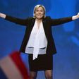 French far-right Front National (FN) party candidate for the presidential election Marine Le Pen waves as she arrives to speak on stage during a campaign rally at the Zenith de Nantes venue in Saint-Herblain on February 26, 2017