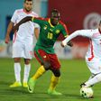 Cameroon's Vincent Aboubakar (L) vies with Tunisia's Naim Sliti (R) during their match on March 24, 2017 at the Ben Jannet stadium in Monastir