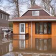 A flooded home in the Montreal borough of Pierrefonds. Floods and heavy rains have led to evacuations and caused extensive damage in waterlogged eastern Canada