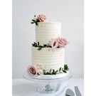 A cake decorated with real flowers (Courtesy)