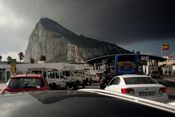Vehicles queue at the border of the British Colony of Gibraltar in La Linea de la Concepcion on April 6, 2017