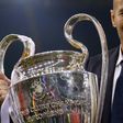 Real Madrid's coach Zinedine Zidane lifts the trophy after Real Madrid won the UEFA Champions League final on June 3, 2017