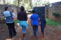 A victim of a past rape incident accompanied by her family