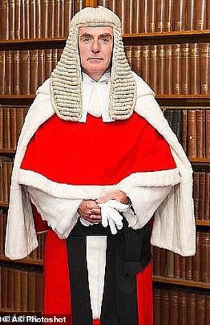 Mr Justice Hayden will decide is it's OK for a man to continue sleeping with his wife of 20 years [Credit: Photoshot]