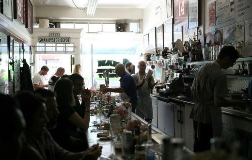 Swan Oyster Depot patrons sit in the dark during a citywide power outage on April 21, 2017 in San Francisco, California