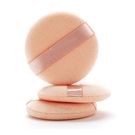 A powder puff sets the foundation better than a brush (Courtesy)