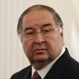 Uzbek-born Russian businessman Alisher Usmanov attends a meeting between Russian President Vladimir Putin and Crown Prince of Abu Dhabi Sheikh Abdullah bin Zayed al-Nahayan during their meeting at the Novo-Ogaryovo state residence outside Moscow Septem...
