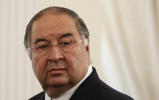 Uzbek-born Russian businessman Alisher Usmanov attends a meeting between Russian President Vladimir Putin and Crown Prince of Abu Dhabi Sheikh Abdullah bin Zayed al-Nahayan during their meeting at the Novo-Ogaryovo state residence outside Moscow Septem...