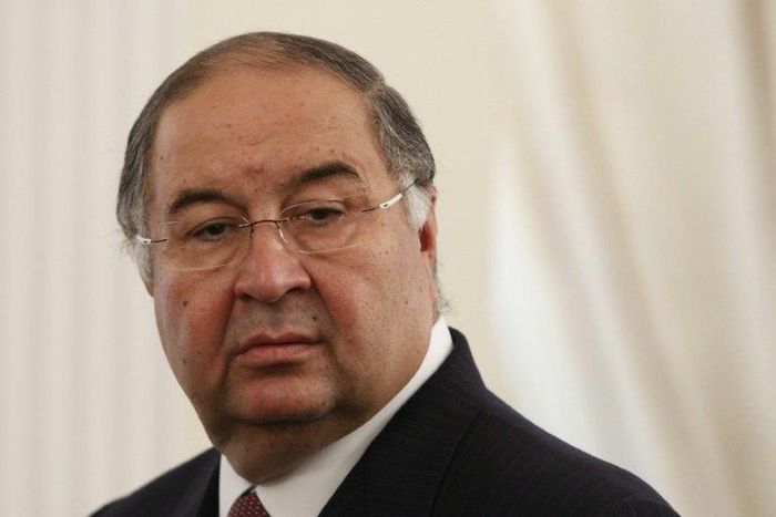 Uzbek-born Russian businessman Alisher Usmanov attends a meeting between Russian President Vladimir Putin and Crown Prince of Abu Dhabi Sheikh Abdullah bin Zayed al-Nahayan during their meeting at the Novo-Ogaryovo state residence outside Moscow Septem...