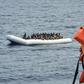 Migrants wait to be rescued off the coast of Libya on November 5, 2016