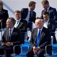 (L-R) NATO Secretary General Jens Stoltenberg, US President Donald Trump and British Prime Minister Theresa May attend the handover ceremony of the new headquarters of NATO in Brussels, on May 25, 2017
