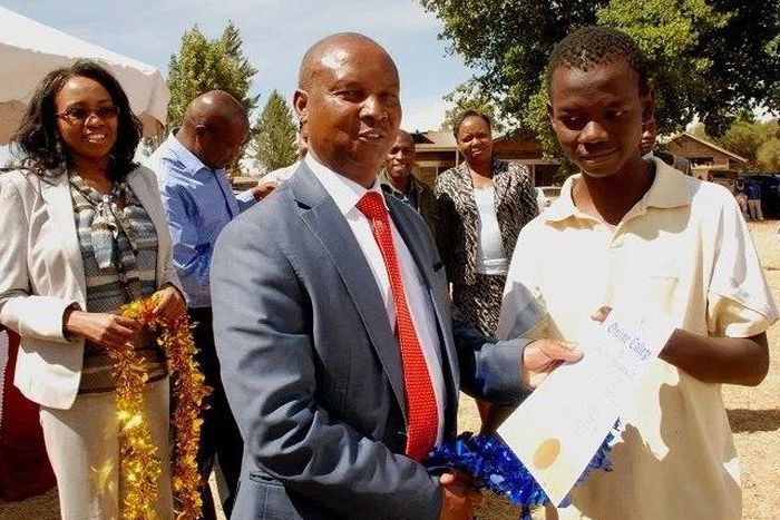 Nakuru Governor Kinuthia Mbugua awards a youth with a computer certificates for excelling in a youth empowerment program funded by the Kiamaina Bursary. The Nakuru County Public Service Board is under investigation after reports revealed that it recrui...