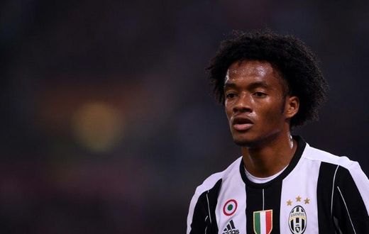 Juventus' midfielder from Colombia Juan Cuadrado looks on during the Italian Serie A football match Roma vs Juventus, on May 14, 2017