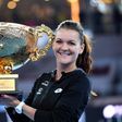 The third-ranked Pole, who cruised through the tournament without dropping a set, sealed her second title in Beijing with an ace for a 6-4, 6-2 win