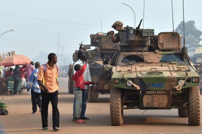 French Sangaris forces patrol in Bangui, Central African Republic in February 2016 as people vote in presidential elections hoping to bring peace after the country's worst sectarian violence since independence in 1960