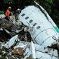 Rescuers work on recovering the bodies of victims of the LAMIA airlines charter that crashed in the mountains of Cerro Gordo, Colombia, on November 29, 2016