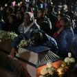 Family and friends mourn the death of their loved ones during the massive wake in San Isidro Chilchotla, Puebla state, Mexico on May 9, 2017, after an explosion at a fireworks warehouse killed 14, all but three of them children
