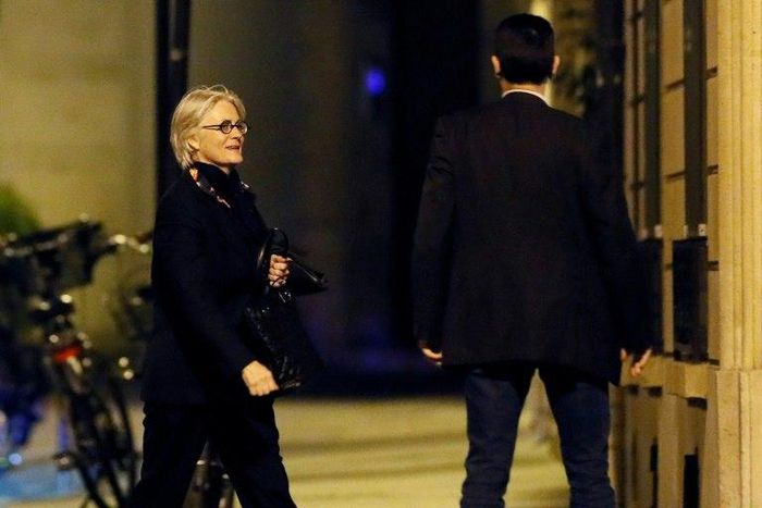 Penelope Fillon, the wife of French presidential candidate Francois Fillon, walks towards her apartment building on March 28, 2017 in Paris
