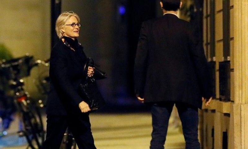 French presidential candidate Francois Fillon's wife, Penelope, seen her outside her Paris apartment, has also been charged in the fake jobs affair