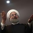 Iranian President Hassan Rouhani gestures during a campaign rally in the northwestern city of Ardabil on May 17, 2017