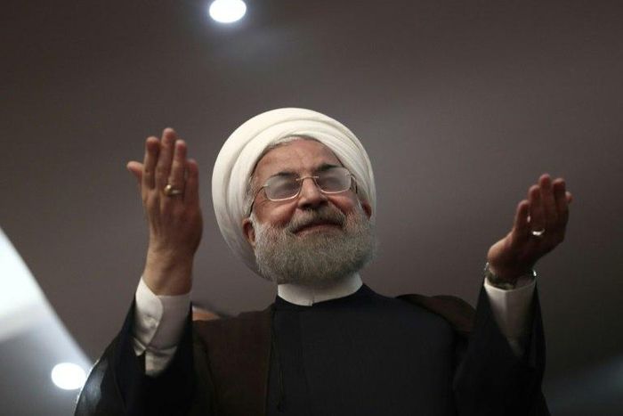 Iranian President Hassan Rouhani gestures during a campaign rally in the northwestern city of Ardabil on May 17, 2017