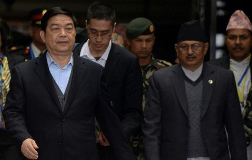 China's Defence Minister Chang Wanquan (L) is escorted by Nepalese officials after his arrival at Tribhuwan International Airport in Kathmandu on March 23, 2017