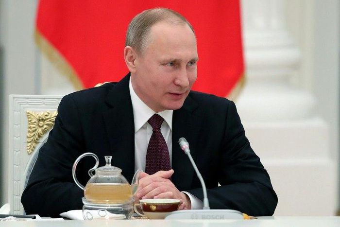 Russian President Vladimir Putin attends a meeting with Northern Fleet officers who took part in the combat activities in the Mediterranean off the coast of Syria at the Kremlin in Moscow on February 23, 2017