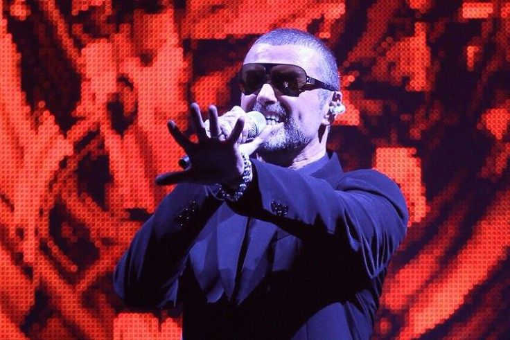 Late British singer George Michael performs on stage in the French city of Nice in September 2011