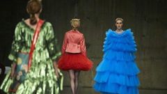 Models present creations by British designer Molly Goddard during London Fashion Week