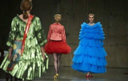 Models present creations by British designer Molly Goddard during London Fashion Week