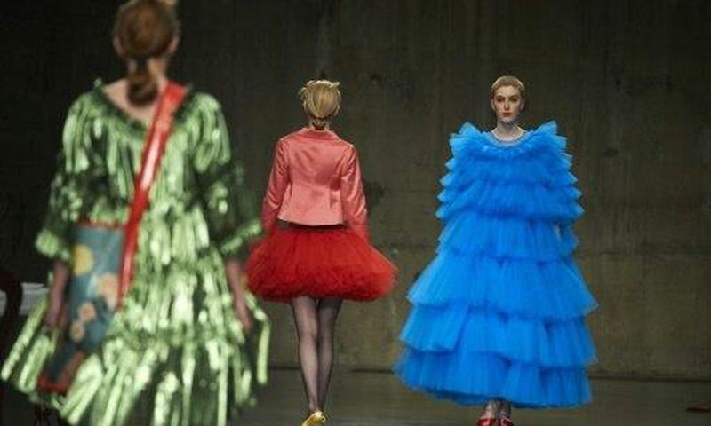 Models present creations by British designer Molly Goddard during London Fashion Week
