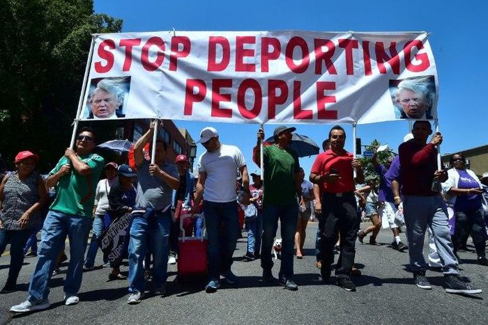 Protesters march against President Donald Trump's immigration policy at a May Day rally in Los Angeles