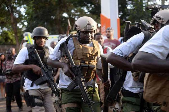 Police arriving at the Dusit complex