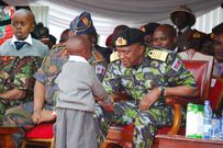 Dennis Ngaruiyah shakes hands with President Uhuru Kenyatta on October 14, 2014.
