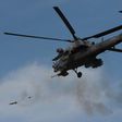 A Russian military helicopter takes part in an exercise on the Black Sea coast in Crimea