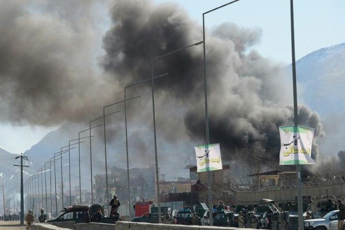 Smoke rises from an Afghan police headquarters building in Kabul after a suicide car bombing on March 1, 2017