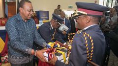Former IG Joseph Boinnet with President Uhuru Kenyatta