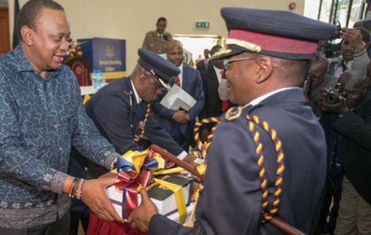 Former IG Joseph Boinnet with President Uhuru Kenyatta