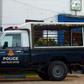 A police vehicle parked outside a police station