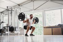 Young man doing Dead lifts