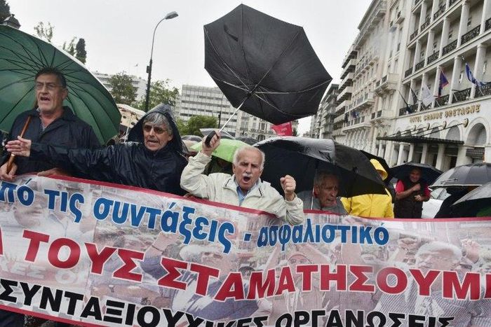 Greek pensioners protest against new austerity cuts outside parliament as Athens looks to deliver a new round of austerity measures