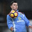 Burnley's defender Michael Keane warms up ahead of the English Premier League football match agaisnt Leicester City at Turf Moor in Burnley, England on January 31, 2017