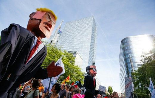 Protesters carried effigies of US President Donald Trump as well as Belgian Prime Minister Charles Michel during a demonstration in Brussels on Wednesday