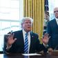 US President Donald Trump, with Vice President Mike Pence (R) speaks from the Oval Office of the White House in Washington, DC, on March 24, 2017