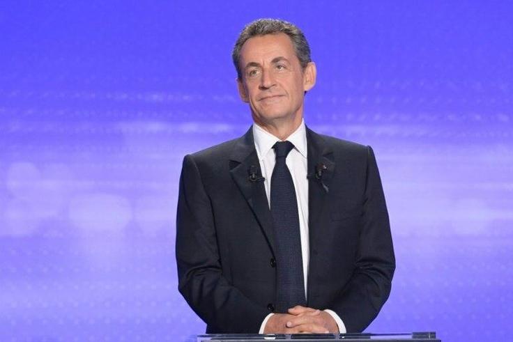 Candidate for the right-wing party primaries ahead of the 2017 presidential election former French president Nicolas Sarkozy prepares to take part in a televised debate at the studios of France 2 in Paris on November 17, 2016