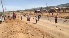 Scene as residents engaged police in running battles after a fire was lit on Patel Farm (Twitter)