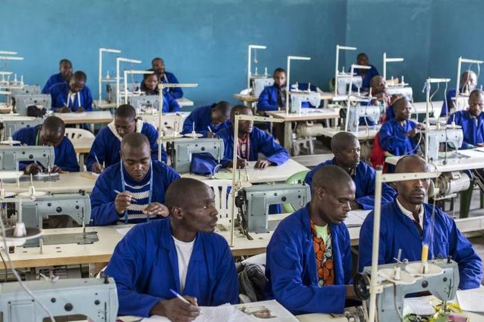 In the classrooms where the men learn their lessons, the mood is serious. 