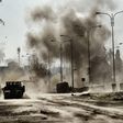 Smoke billows following a car bomb explosion as Iraqi forces clash with Islamic State (IS) group fighters in Mosul, northern Iraq on March 5, 2017, during an offensive to retake the western parts of the city from the jihadists