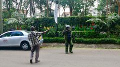 An officer from the Bomb Disposal Unit going to detonate explosives at the DusitD2 complex