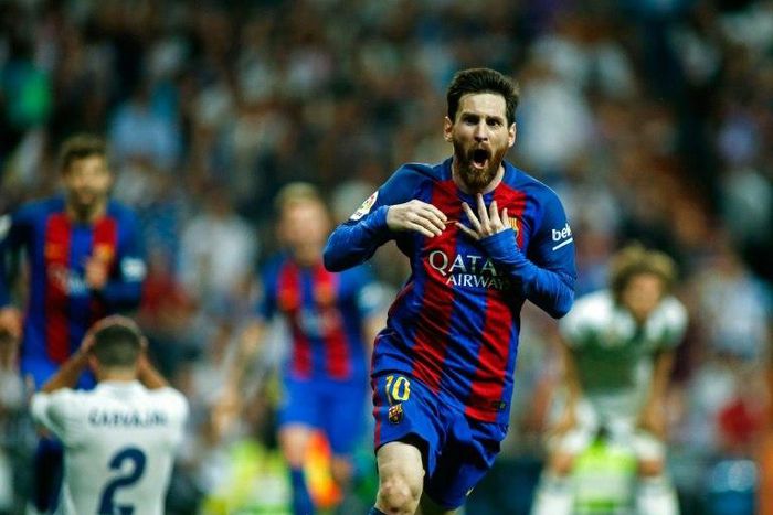 Barcelona's forward Lionel Messi celebrates after scoring on April 23, 2017